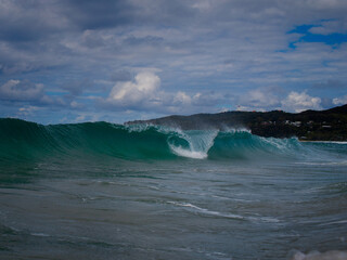 Wave breaking at Cape Byron, Australia.