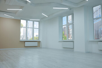 Fototapeta na wymiar New empty room with clean windows and light walls