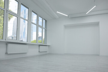 Fototapeta na wymiar New empty room with clean windows and white walls