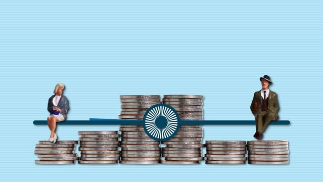 A pile of coins and miniature people with graphs. The concept of gender disparity in employment.
