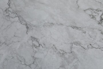 Texture of light grey marble surface as background, closeup