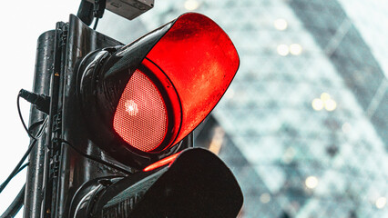 Red traffic light in a busy city center