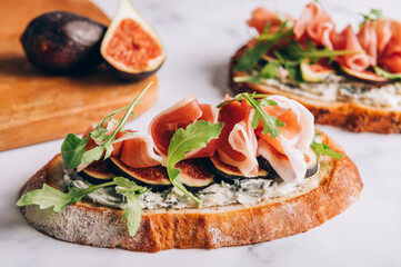 Open Sandwich with Blue Cheese, Figs, Rocket salad leaves and Prosciutto