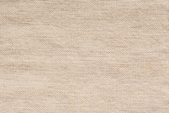Natural fabric linen texture for design. sackcloth textured. Brown Canvas for Background. Cotton.