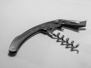 Wine bottle opener in black and white photography.