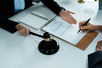 The signing of important documents between the lawyer and the client to enter into an agreement in a court case