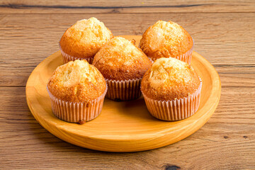 muffins on a wooden table