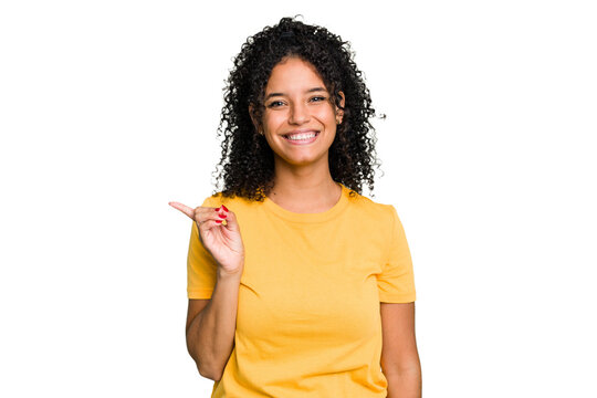 Young cute brazilian woman isolated smiling cheerfully pointing with forefinger away.