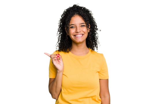 Young cute brazilian woman isolated smiling cheerfully pointing with forefinger away.