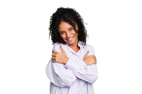 Young cute brazilian woman isolated hugs, smiling carefree and happy.