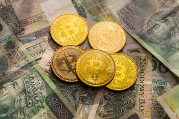 Bitcoin and Polish money, close up