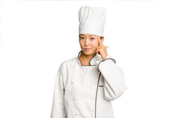 Young asian cook woman isolated pointing temple with finger, thinking, focused on a task.