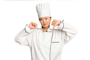 Young asian cook woman isolated feels proud and self confident, example to follow.