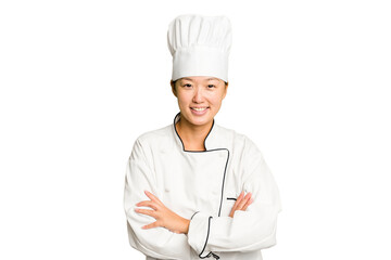 Young asian cook woman isolated laughing and having fun.