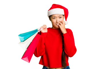 Young asian woman shopping a christmas presents isolated Young asian woman shopping a christmas presents isolated biting fingernails, nervous and very anxious.