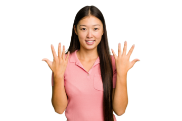 Young Asian woman isolated showing number ten with hands.
