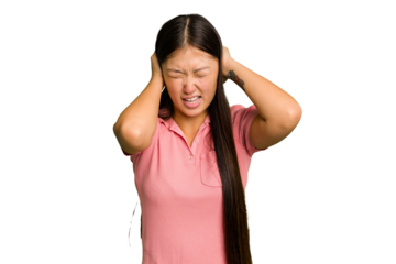 Young Asian woman isolated covering ears with hands trying not to hear too loud sound.