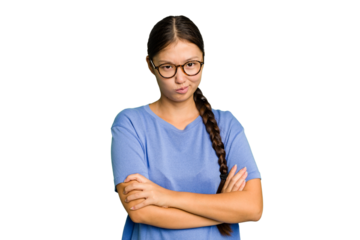 Young Asian woman isolated frowning face in displeasure, keeps arms folded.