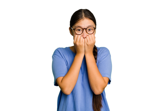 Young Asian woman isolated biting fingernails, nervous and very anxious.