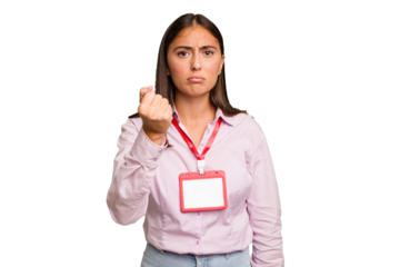 Young caucasian woman with a badge isolated showing fist to camera, aggressive facial expression.