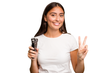 Young caucasian woman holding a razor isolated showing number two with fingers.
