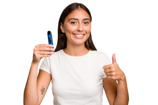 Young caucasian woman holding a electronic cigarette smiling and raising thumb up - Powered by Adobe