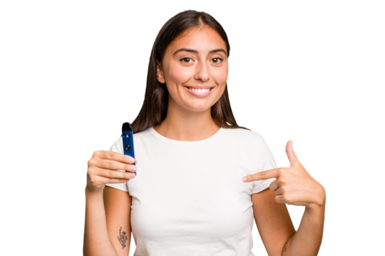 Young caucasian woman holding a electronic cigarette person pointing by hand to a shirt copy space, proud and confident