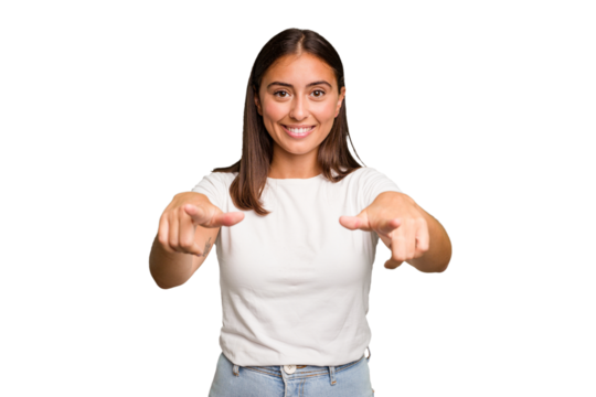 Young cute caucasian woman isolated cheerful smiles pointing to front.