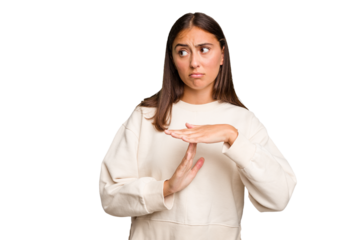 Young cute caucasian woman isolated showing a timeout gesture.