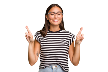 Young cute caucasian woman isolated crossing fingers for having luck