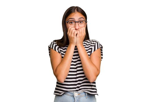 Young cute caucasian woman isolated biting fingernails, nervous and very anxious.