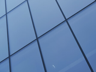 Blue glass panels of modern building