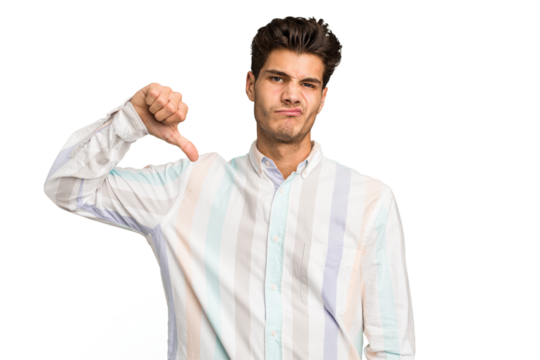 Young caucasian handsome man isolated showing thumb down, disappointment concept.
