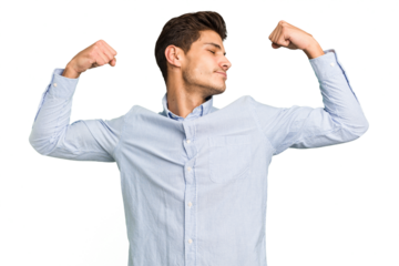 Young caucasian handsome man isolated showing strength gesture with arms, symbol of feminine power