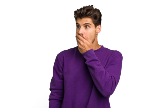 Young caucasian handsome man isolated thoughtful looking to a copy space covering mouth with hand.