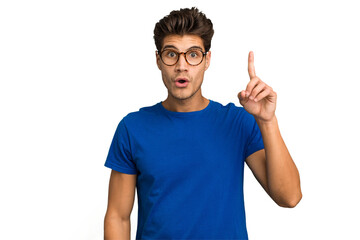 Young caucasian handsome man isolated pointing upside with opened mouth.