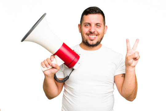 Young caucasian man holding a megaphone isolated showing number two with fingers.