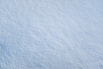 Obraz premium Snow background, top view. Fresh snow texture. Winter backdrop for publication, poster, screensaver, wallpaper, postcard, banner, cover, post. High quality photo