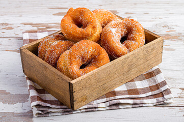 doughnuts in a wooden box