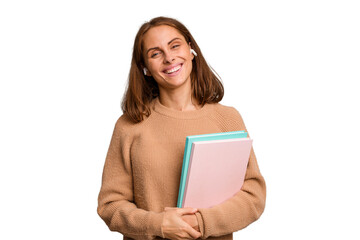 Young student woman holding a books isolated happy, smiling and cheerful. - obrazy, fototapety, plakaty