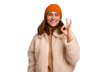Young caucasian woman wearing winter clothes isolated cheerful and confident showing ok gesture.