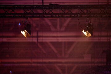 spotlights on black truss at en event 