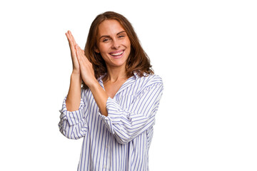 Young caucasian woman isolated feeling energetic and comfortable, rubbing hands confident.