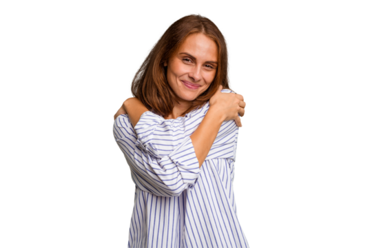 Young caucasian woman isolated hugs, smiling carefree and happy.