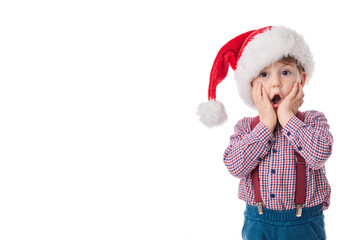 Good baby boy with surprised expression, wearing in tie, suspender and Santa Claus cloth, Christmas concept