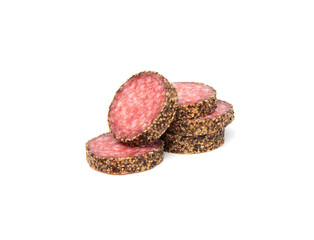 Peppered salami sausage slices isolated on white background