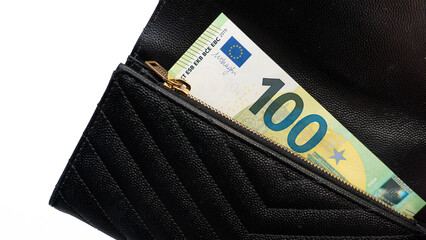Euro cash money.  Paper money in a black, leather wallet close up. Cash of paper currency background, isolated on white background.