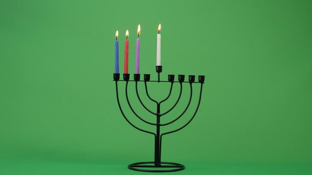 Hanukkah menorah third night candle 4k 10bit greenscreen 3 closeup