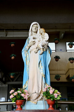 Statue of Our lady virgin Mary with Child Jesus in catholic church, Thailand. selective focus.