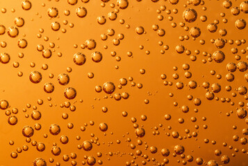 Glossi, orange background with soda bubbles, horizontal